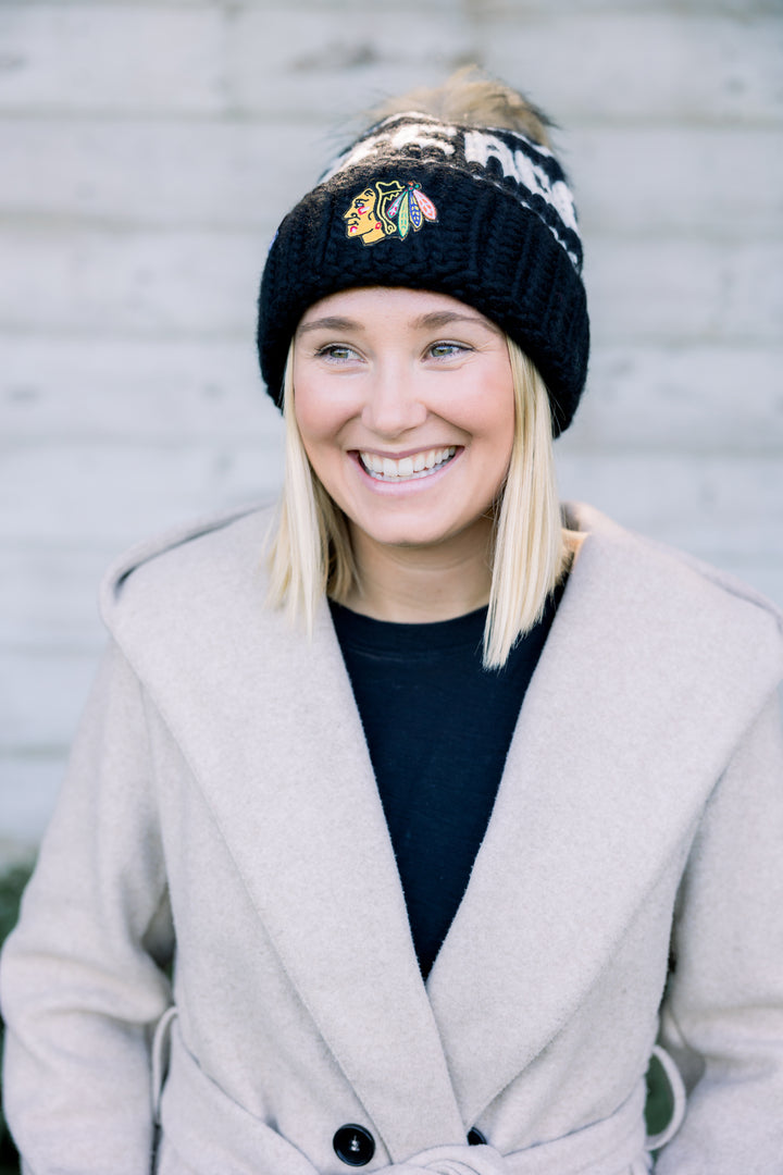 black Chicago Blackhawks beanie with detachable tan pom - lifestyle imagery