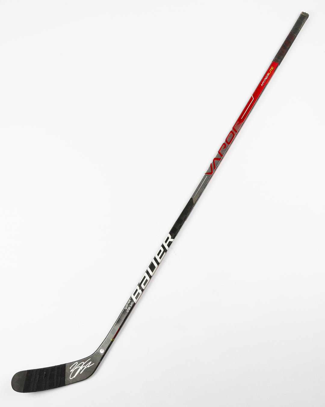 signed game-used Bauer hockey stick from Chicago Blackhawks Nikita Zaitsev - front lay flat