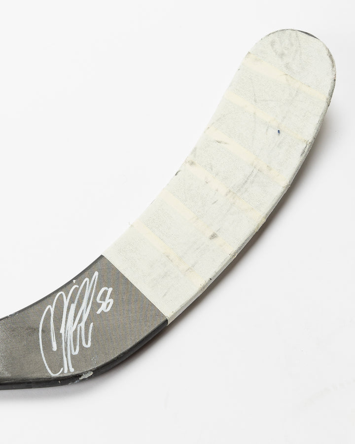 signed game-used Bauer hockey stick from former Chicago Blackahawks Erik Gustafsson - signed detail lay flat