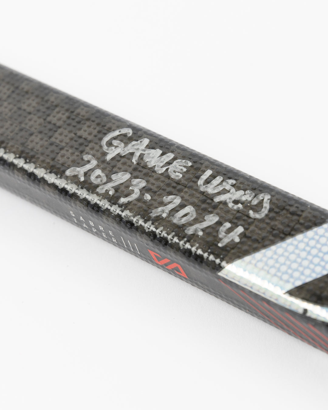 game-used hockey stick used and signed by Chicago Blackhawks Ryan Donato - alt detail lay flat