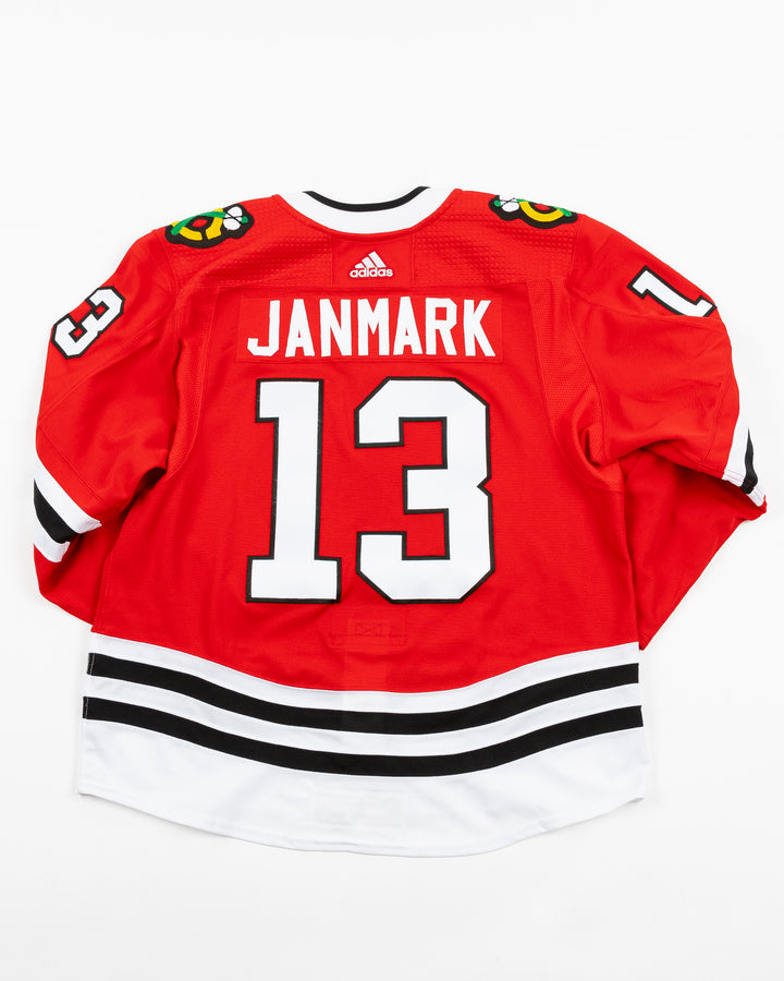 red team issued Chicago Blackhawks jersey with Mattias Janmark name and number - back lay flat