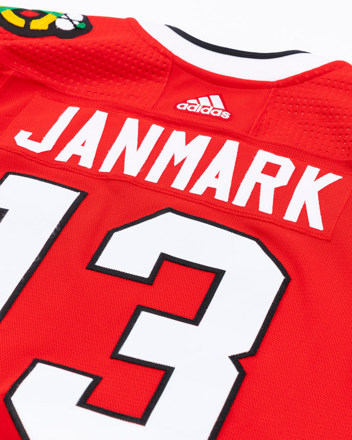 red team issued Chicago Blackhawks jersey with Mattias Janmark name and number - back detail lay flat