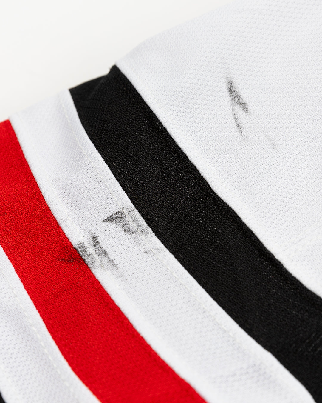 white team issued Chicago Blackhawks jersey with Collin Delia name and number - scuff detail lay flat