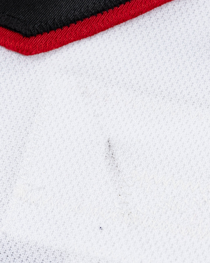 white team issued David Kampf Chicago Blackhawks jersey - scuff detail lay flat