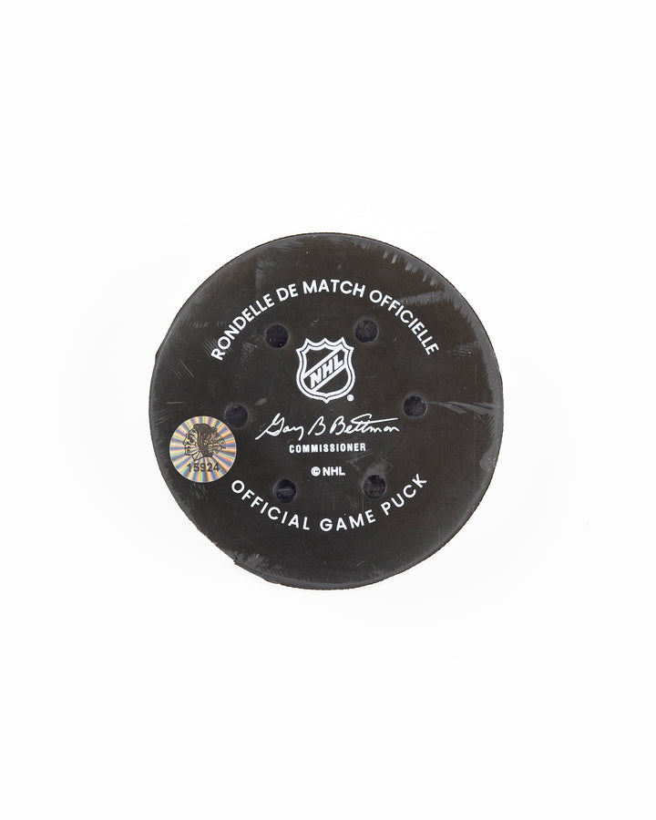 Chicago Blackhawks official game used puck against Anaheim Ducks in November 2024 - back lay flat