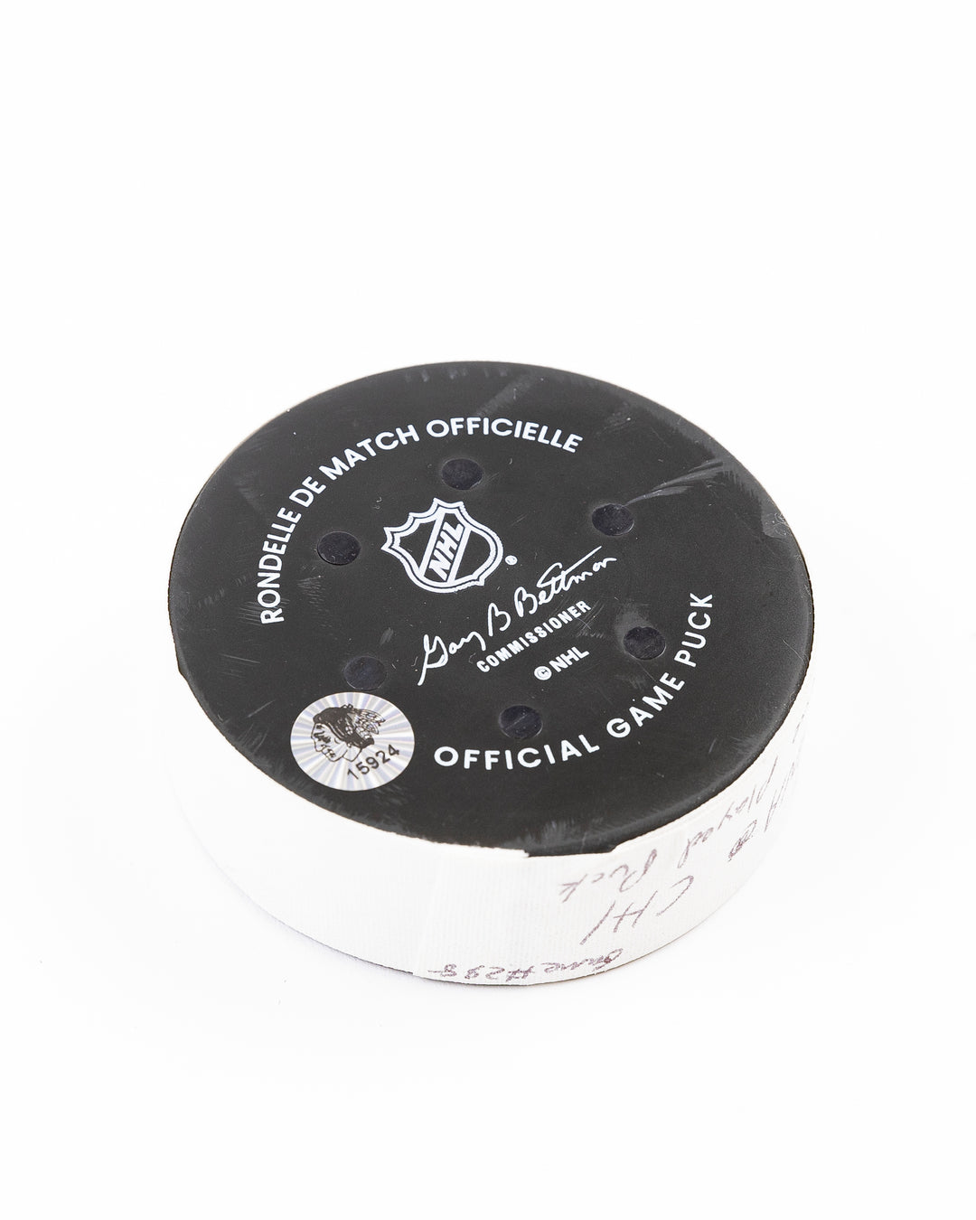 Chicago Blackhawks official game used puck against Anaheim Ducks in November 2024 - back angle lay flat