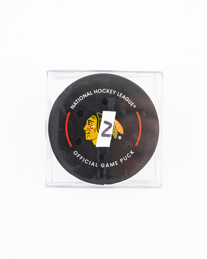 official Chicago Blackhawks hockey goal puck scored by Craig Smith against the Florida Panthers in November 2024 - front lay flat