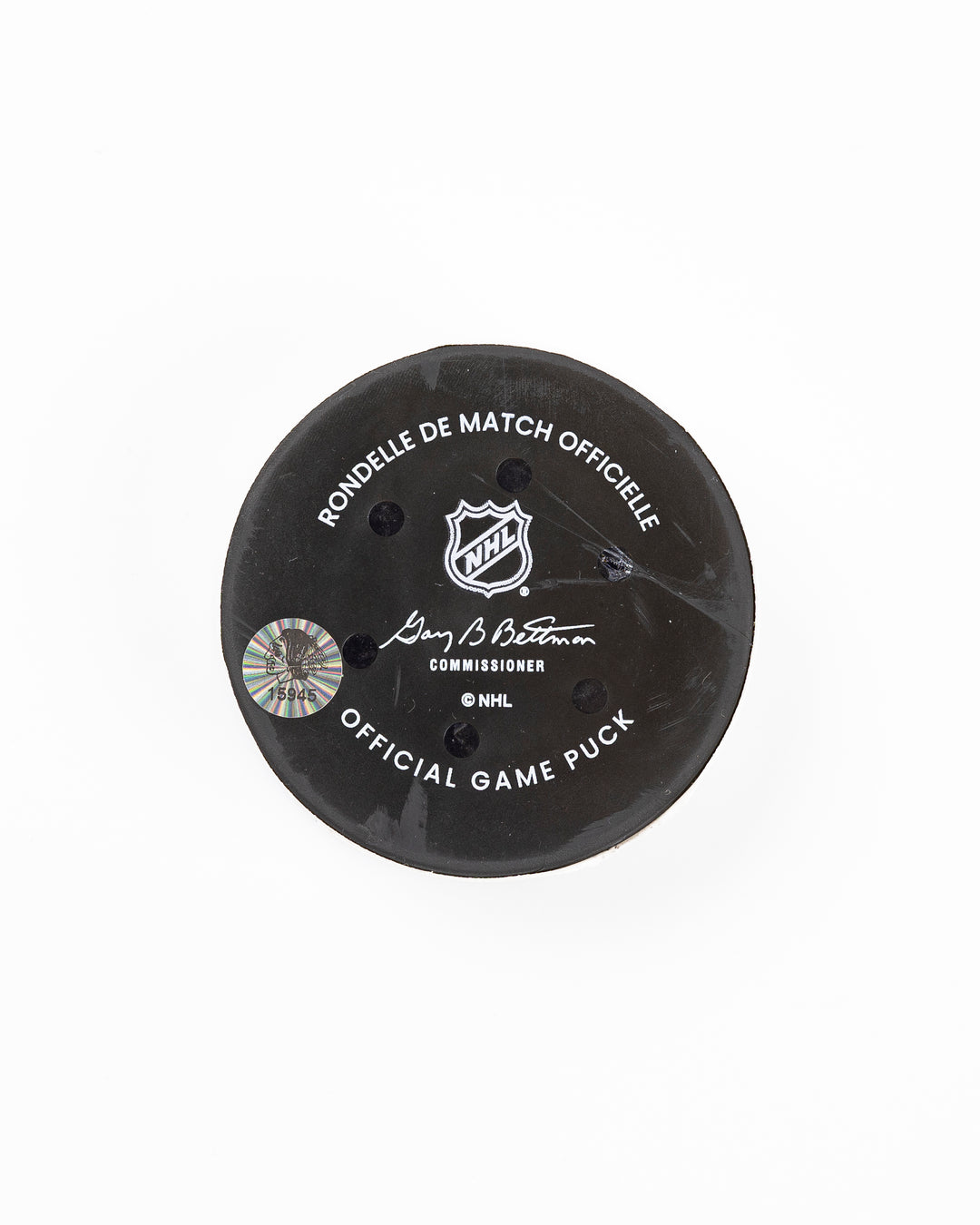 official Chicago Blackhawks hockey goal puck scored by Craig Smith against the Florida Panthers in November 2024 - back lay flat