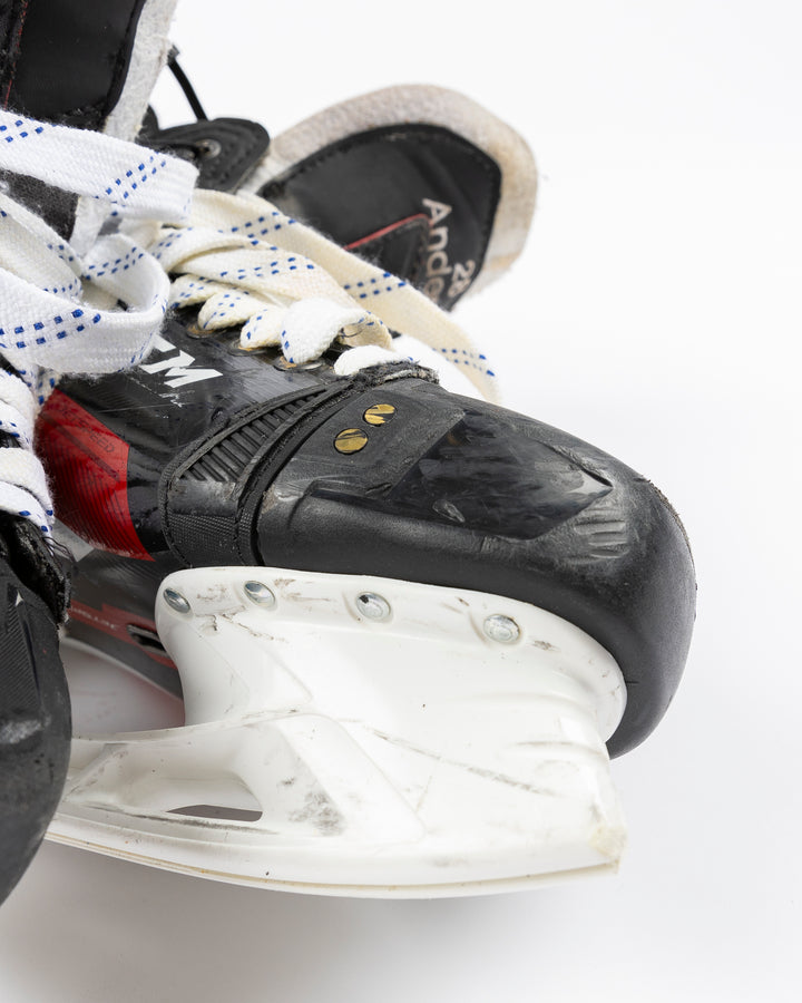 black CCM hockey skates worn by Chicago Blackhawks player Joey Anderson - front detail lay flat