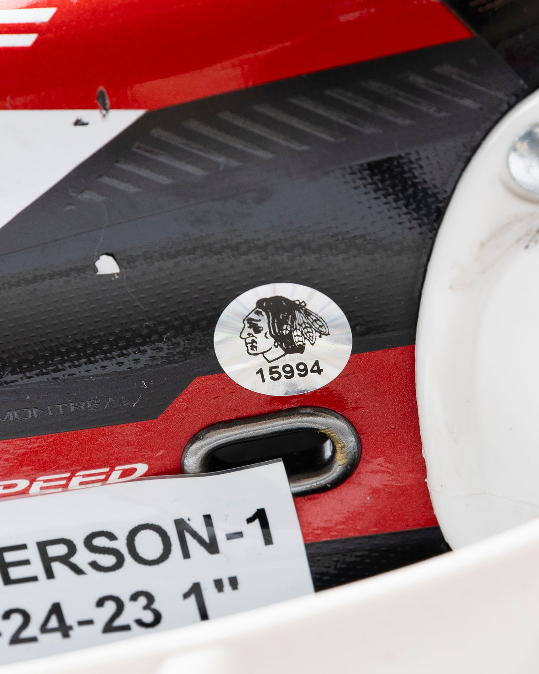 black CCM hockey skates worn by Chicago Blackhawks player Joey Anderson - sticker  detail lay flat