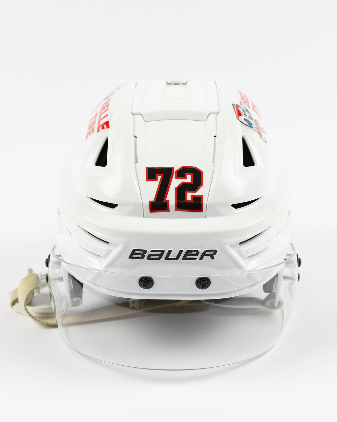 white Bauer hockey helmet used and worn by Chicago Blackhawks player Alex Vlasic - front lay flat