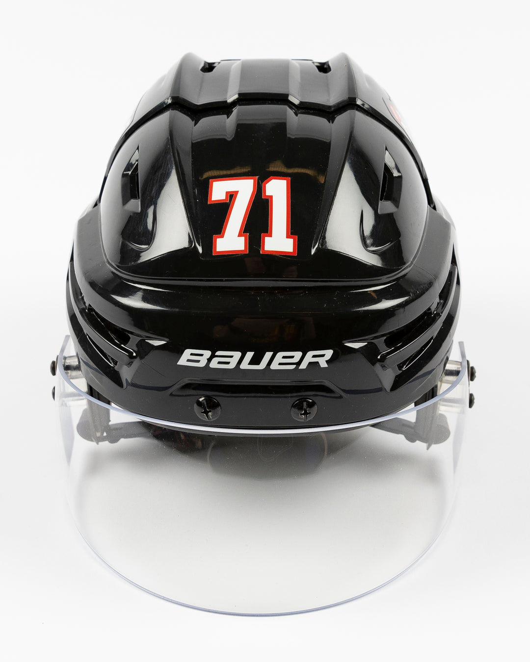 black Bauer hockey helmet used by Chicago Blackhawks player Taylor Hall - front lay flat