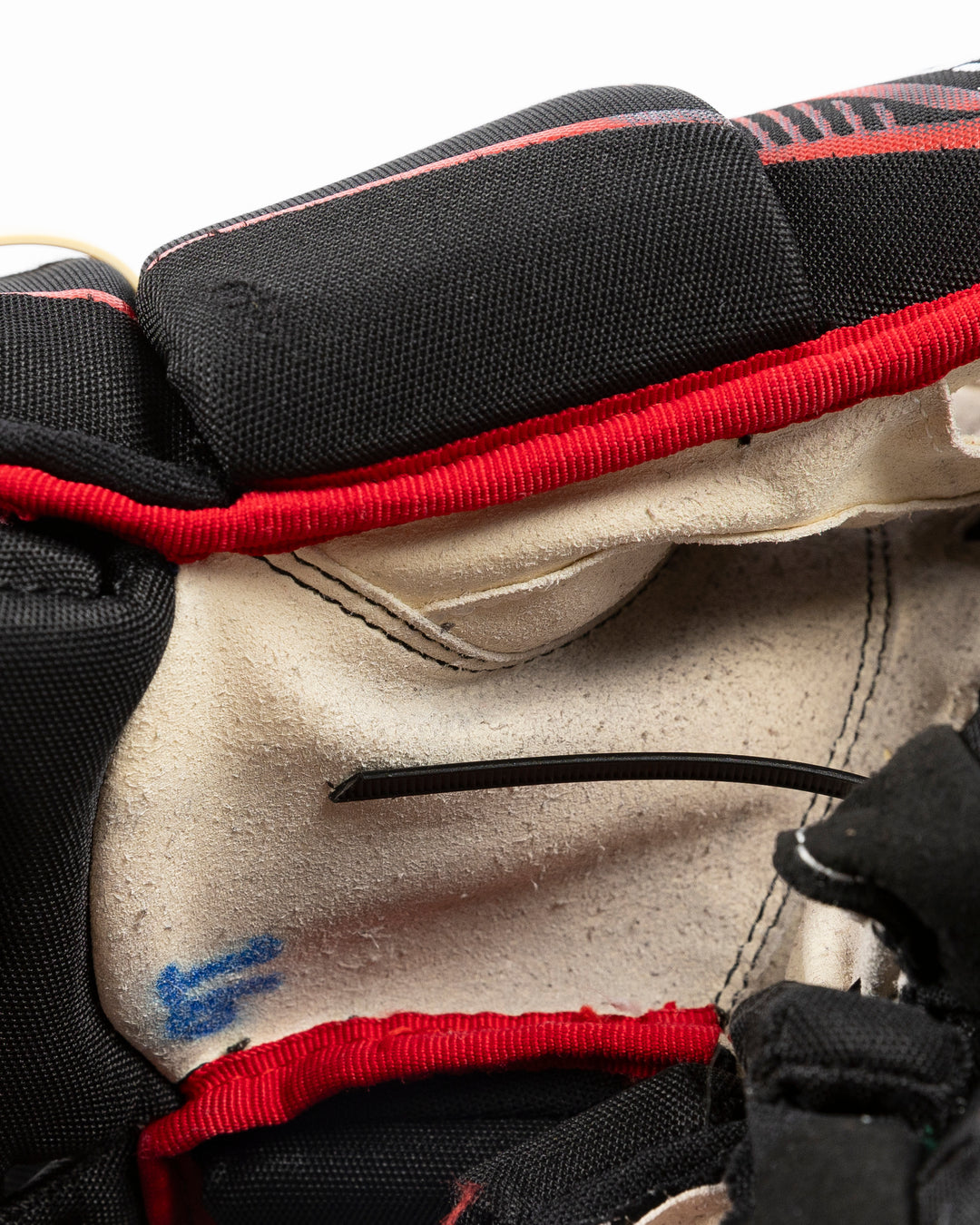 black CCM hockey gloves used by Chicago Blackhawks player Jason Dickinson - palm detail lay flat