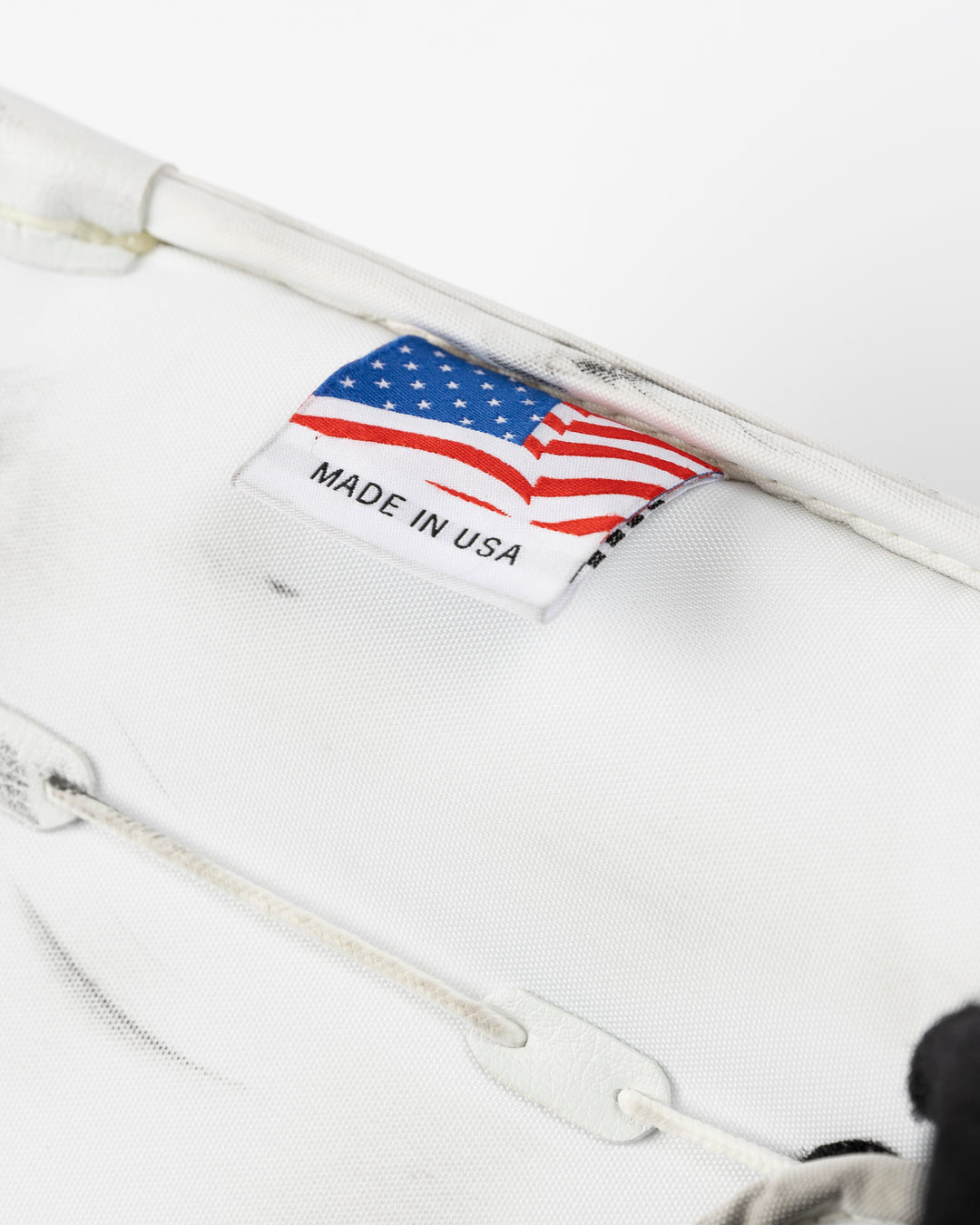 white Vaughn goalie pads used by Chicago Blackhawks goalie Petr Mrazek - made in usa tag lay flat