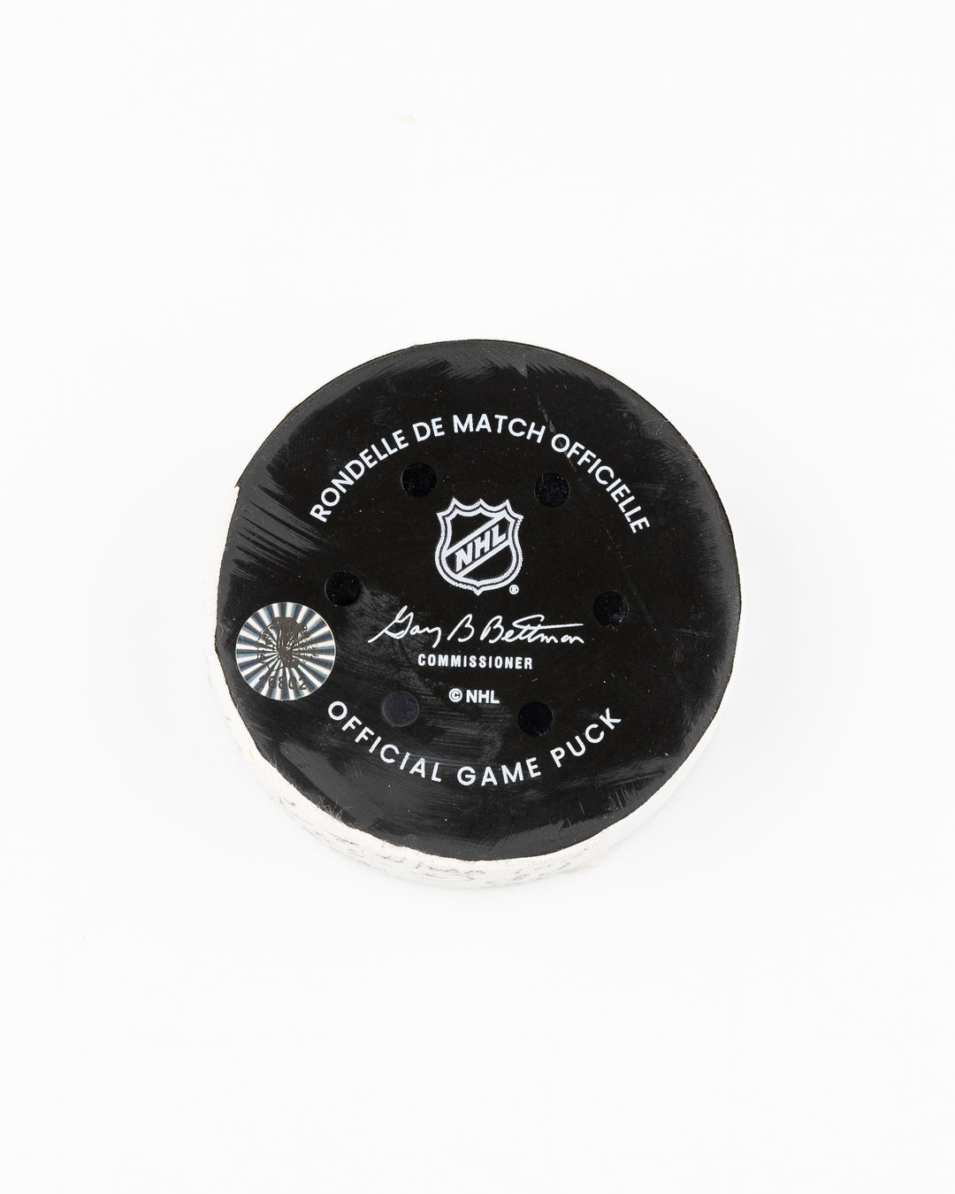 official Chicago Blackhawks hockey puck game used and scored by player Tyler Bertuzzi - back lay flat
