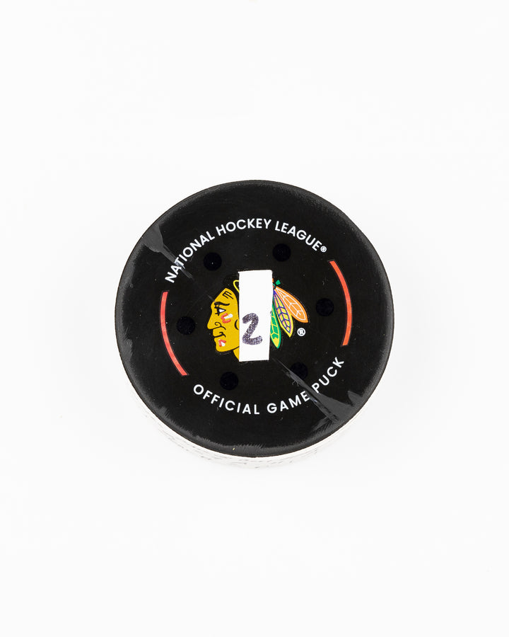 official Chicago Blackhawks game used goal puck scored by Tyler Bertuzzi against the Carolina Hurricanes on January 20, 2025 - front lay flat