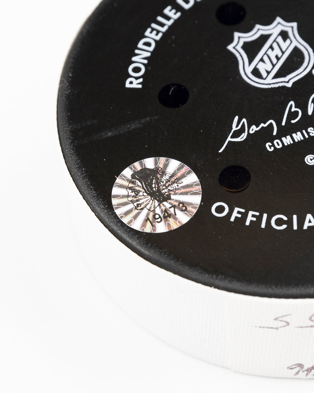official Chicago Blackhawks game used goal puck scored by Tyler Bertuzzi against the Carolina Hurricanes on January 20, 2025 - hologram sticker detail lay flat