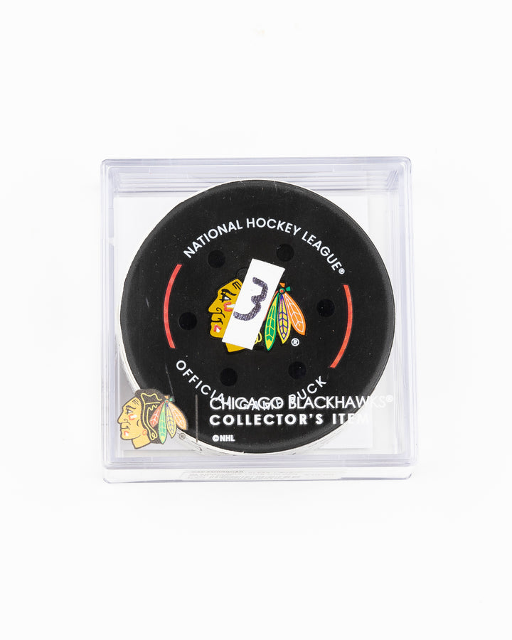 official Chicago Blackhawks game used goal puck scored by Tyler Bertuzzi against the Vegas Golden Knights on January 18, 2025 - front lay flat in case