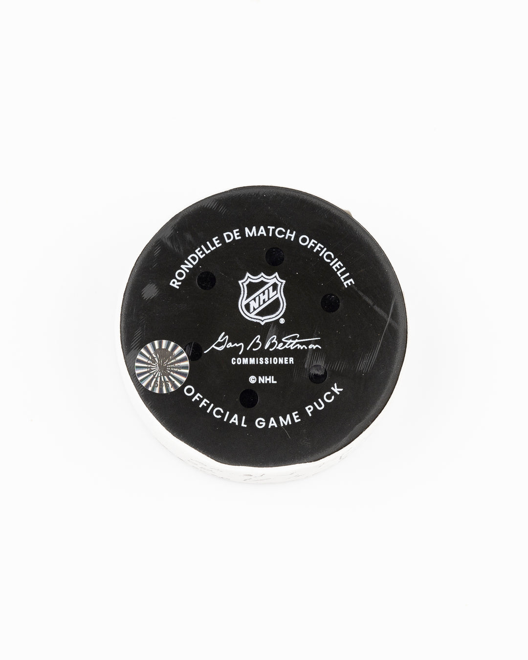 official Chicago Blackhawks game used goal puck scored by Tyler Bertuzzi against the Vegas Golden Knights on January 18, 2025 - back lay flat