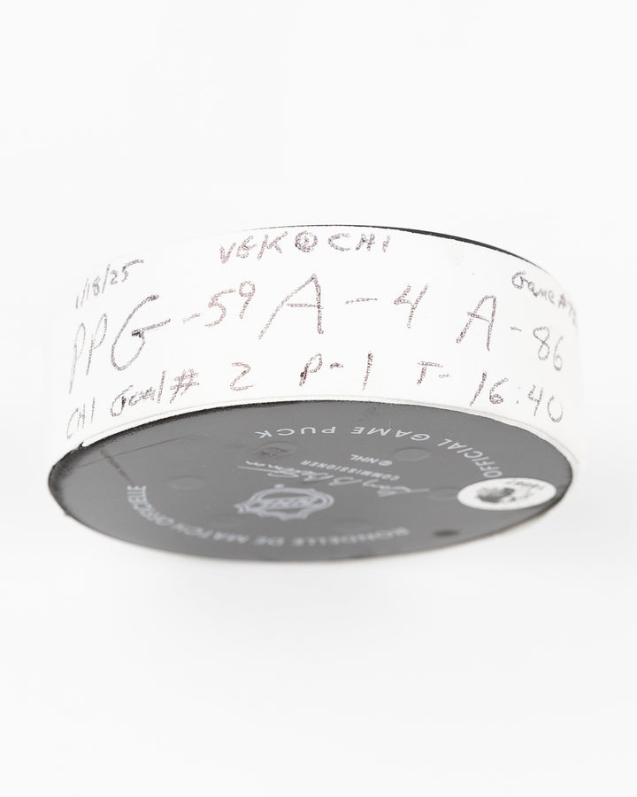 official Chicago Blackhawks game used goal puck scored by Tyler Bertuzzi against the Vegas Golden Knights on January 18, 2025 - tape detail lay flat