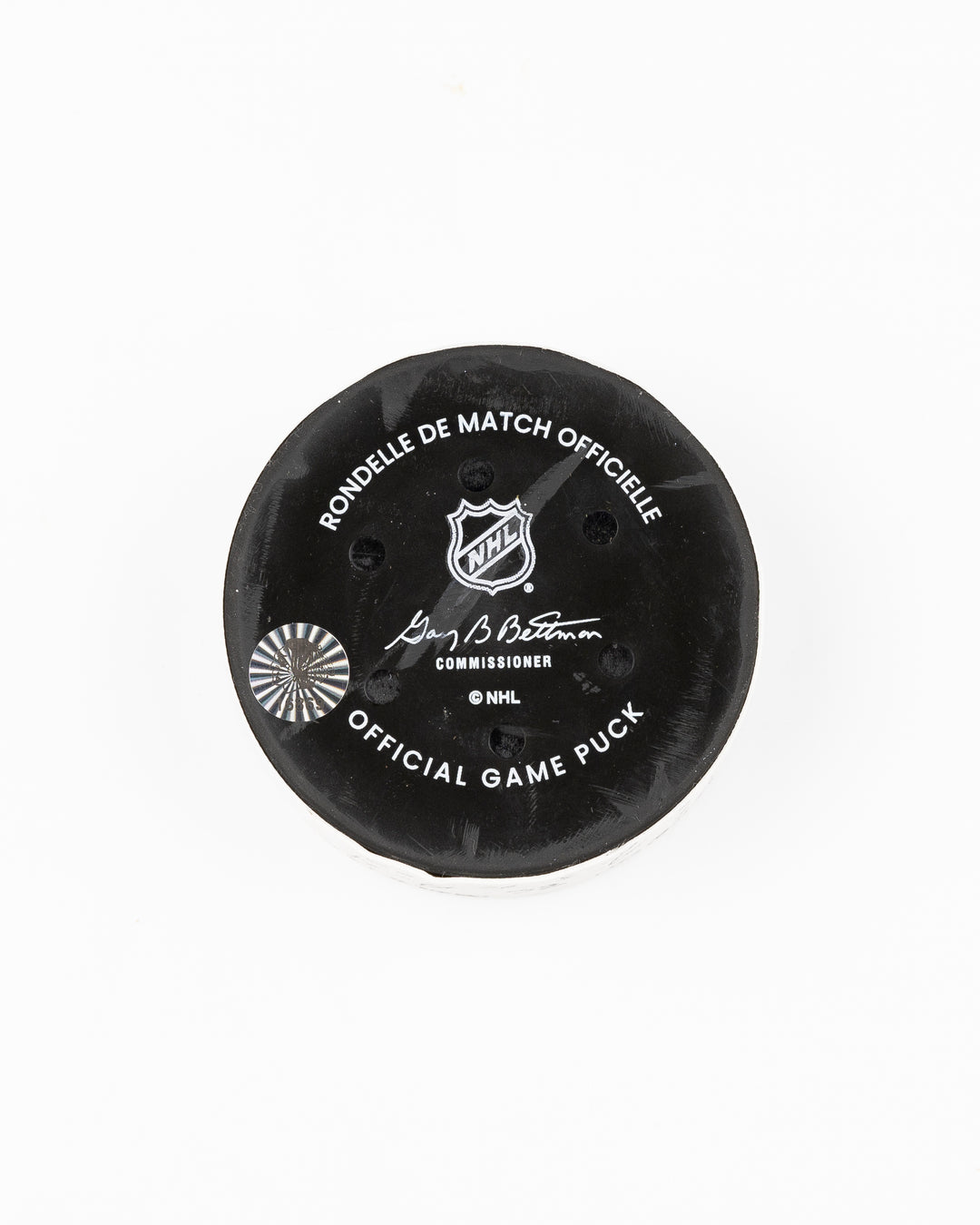 offcial Chicago Blackhawks game used goal hockey puck scored by Tyler Bertuzzi against Vegas Golden Knights on January 18, 2025 - back lay flat
