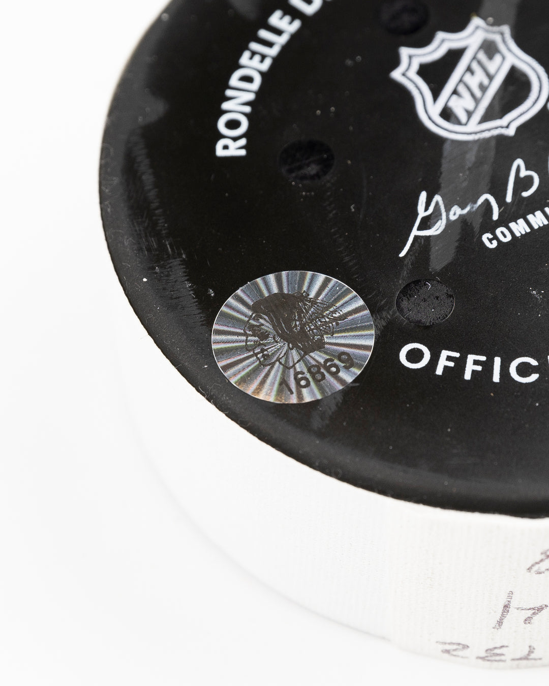 offcial Chicago Blackhawks game used goal hockey puck scored by Tyler Bertuzzi against Vegas Golden Knights on January 18, 2025 - hologram sticker detail lay flat