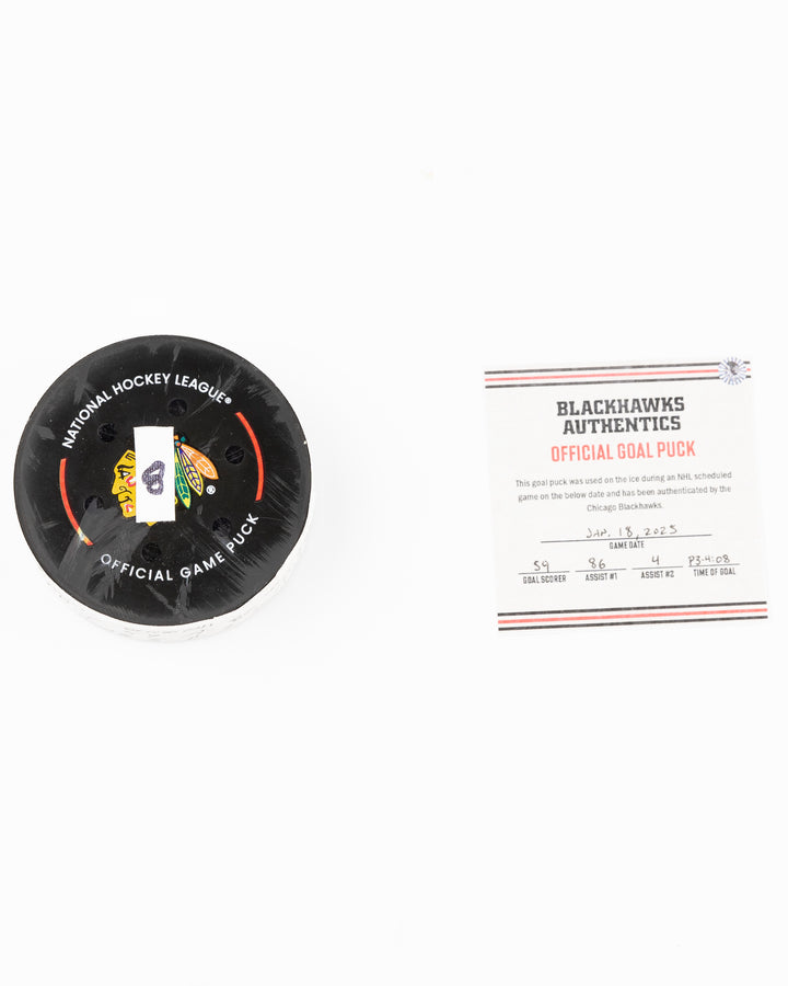 offcial Chicago Blackhawks game used goal hockey puck scored by Tyler Bertuzzi against Vegas Golden Knights on January 18, 2025 - front lay flat puck and certificate