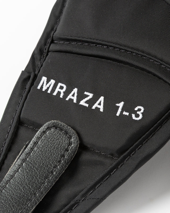 black hockey goalie glove Vaughn brand game used and game worn by former Chicago Blackhawks goalie Petr Mrazek - name stitching detail lay flat