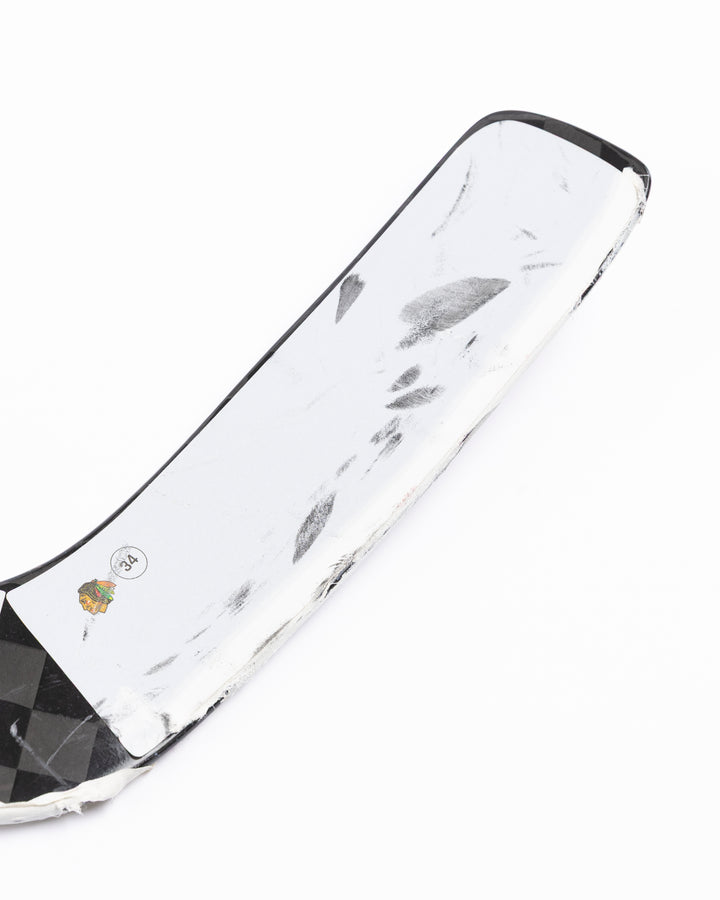 WARRIOR brand hockey goalie stick used in game by former Chicago Blackhawks goalie Petr Mrazek - scuff detail lay flat