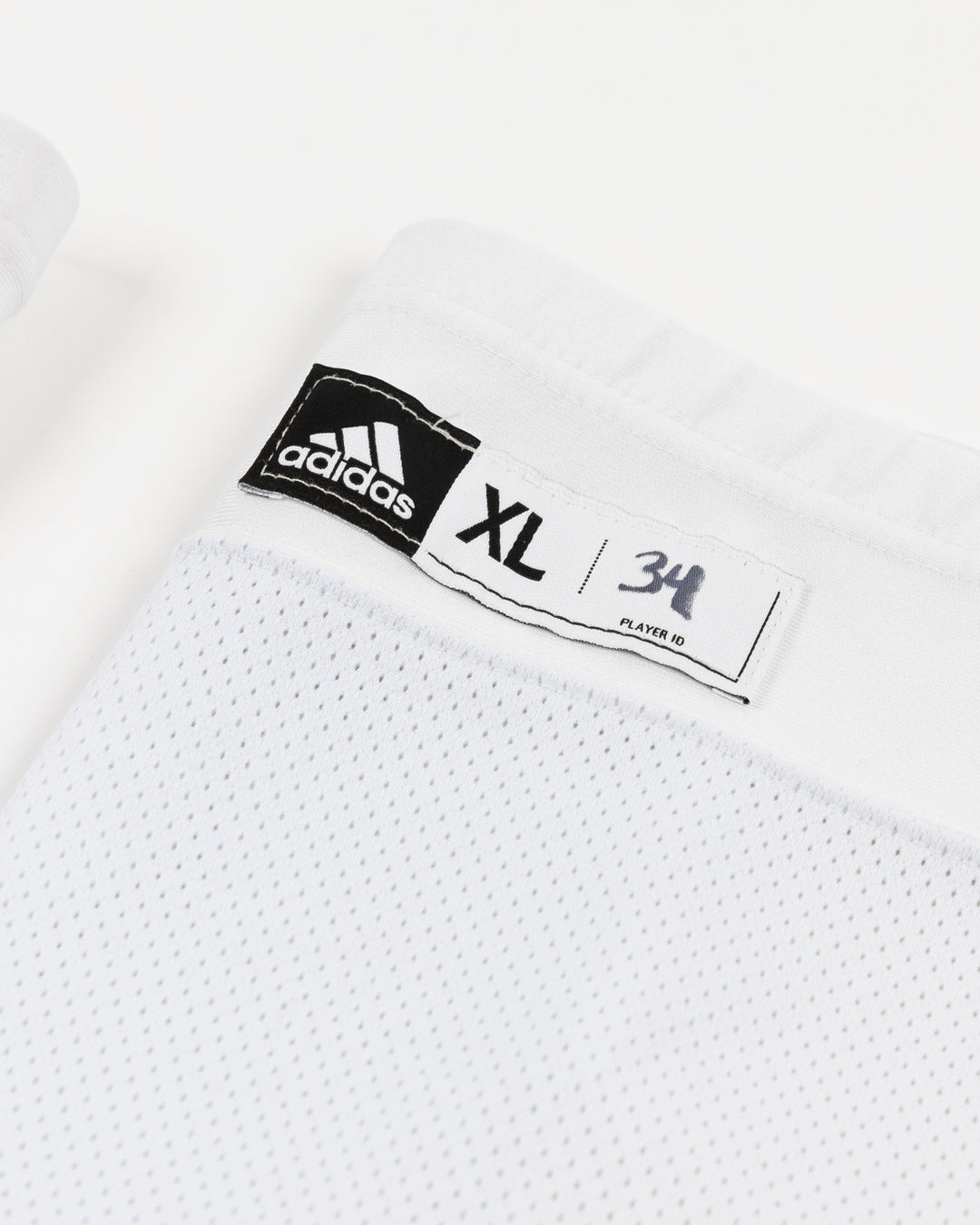 white adidas hockey socks used by Chicago Blackhawks goalie Petr Mrazek - size detail lay flat