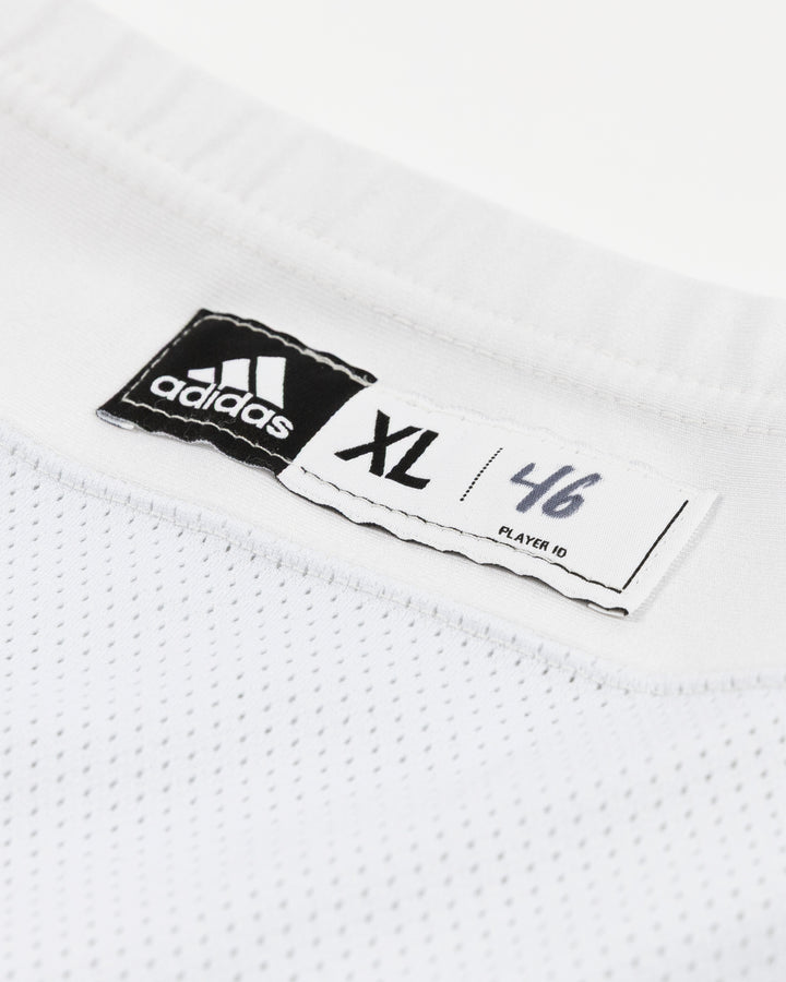 white adidas hockey socks used by Chicago Blackhawks player Louis Crevier - size tag detail lay flat