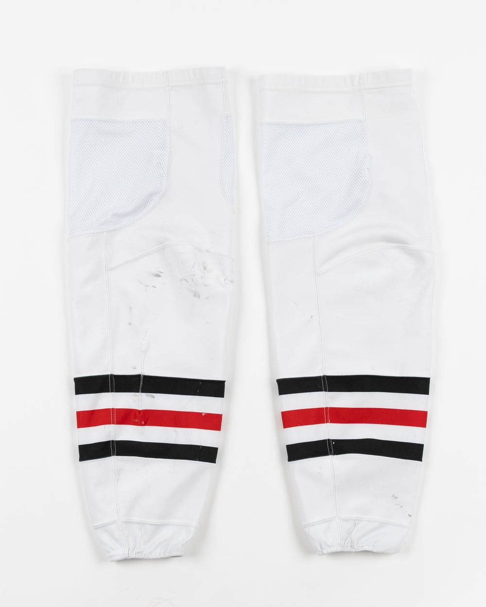 white adidas hockey socks used by Chicago Blackhawks player Louis Crevier - back lay flat