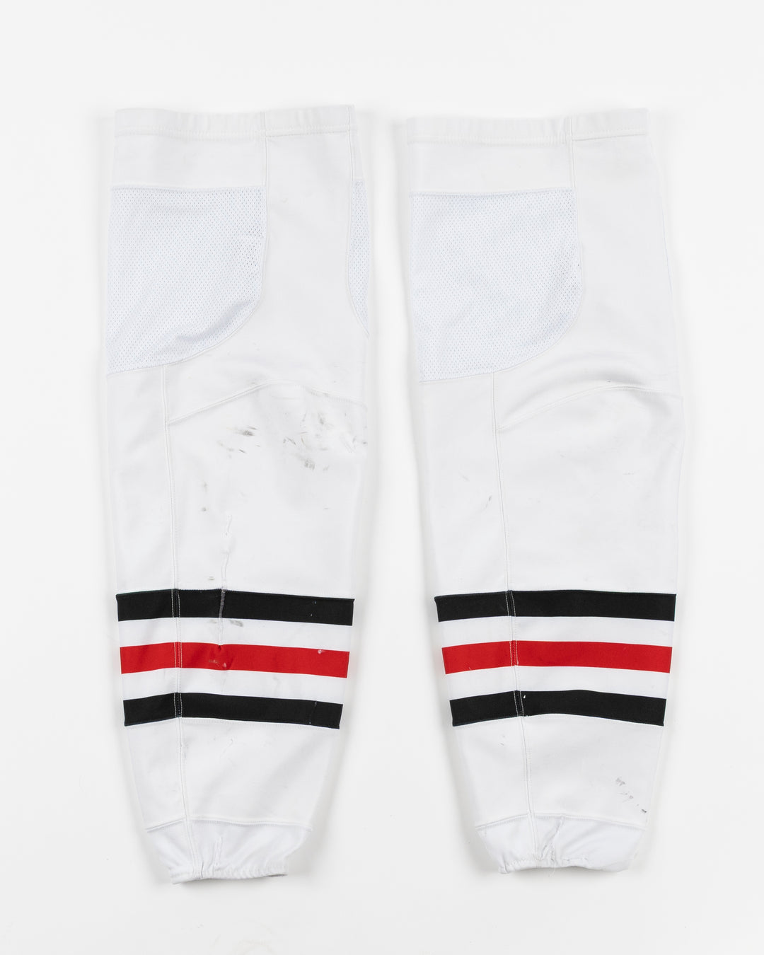 white adidas hockey socks used by Chicago Blackhawks player Louis Crevier - back lay flat