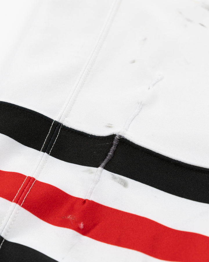 white adidas hockey socks used by Chicago Blackhawks player Louis Crevier - stitch detail lay flat