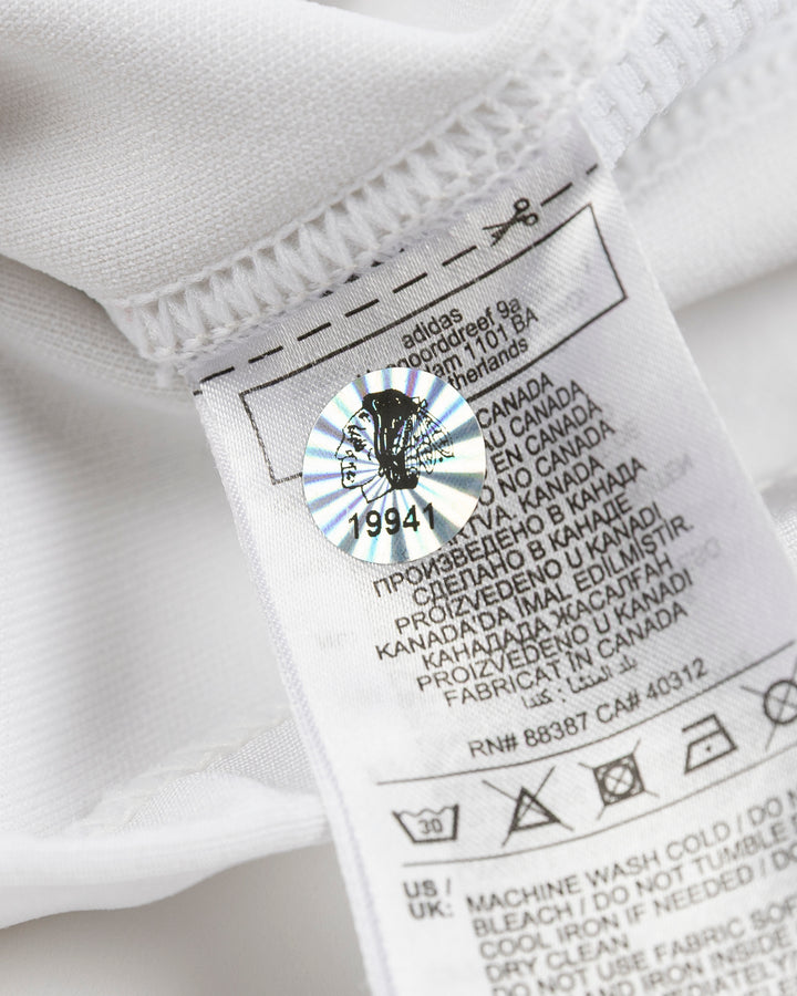 white adidas hockey socks used by Chicago Blackhawks player Louis Crevier - hologram sticker detail lay flat