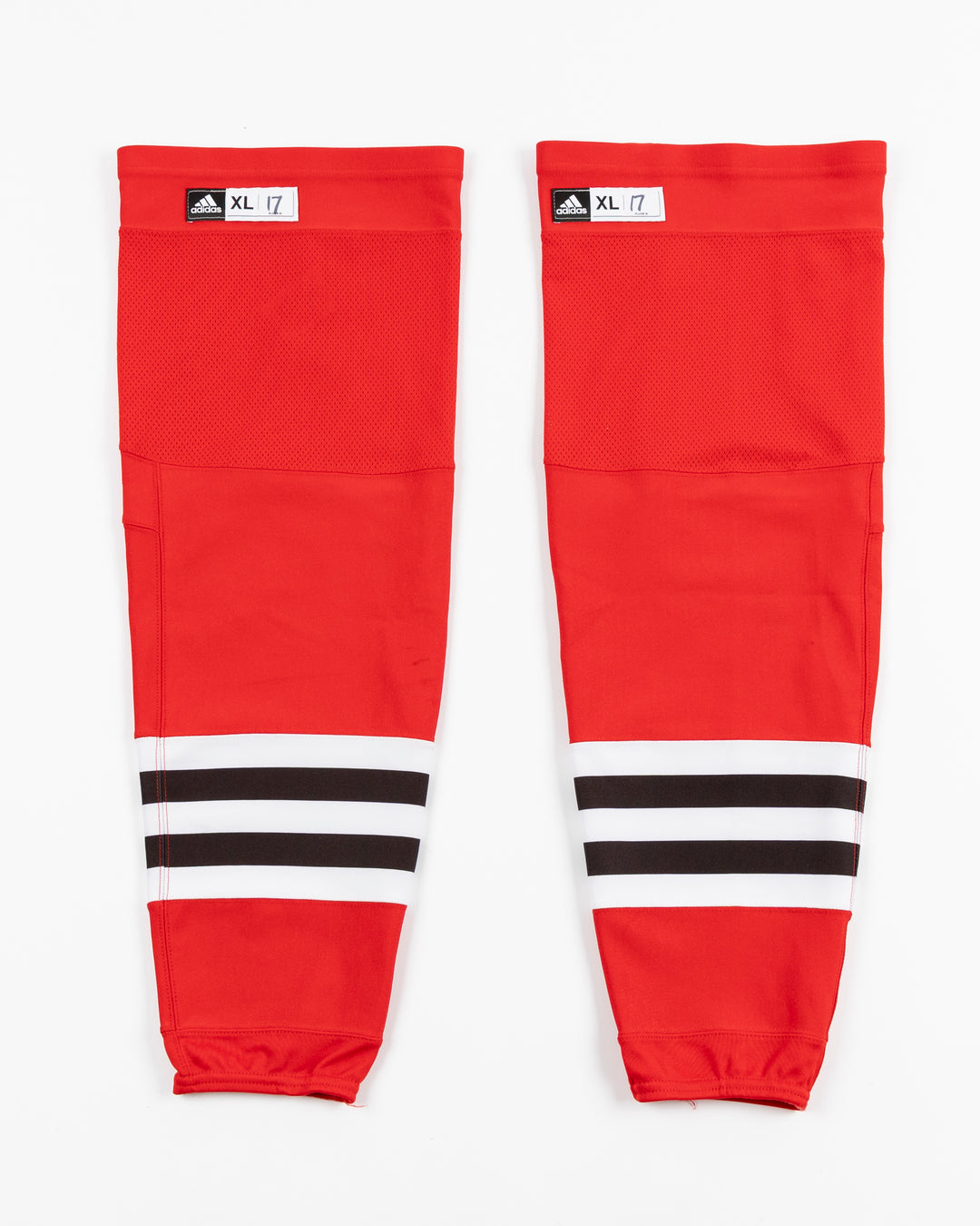 red adidas hockey socks used by Chicago Blackhawks player Nick Foligno - front lay flat