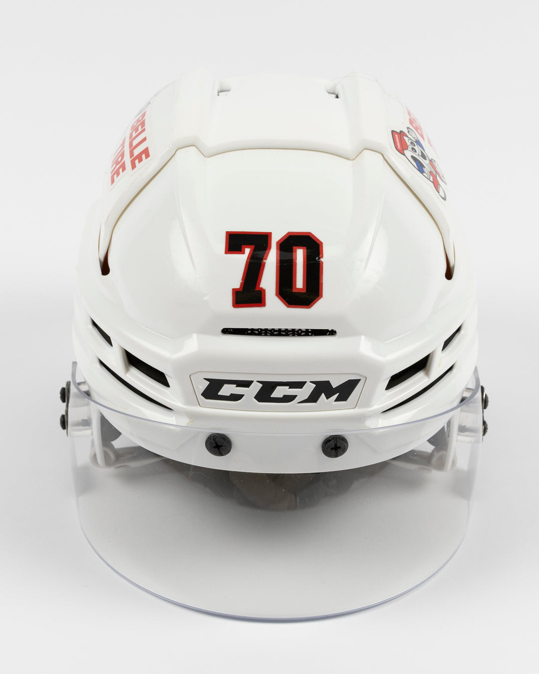 white CCM hockey helmet worn and used by Chicago Blackhawks player Cole Guttman - front lay flat