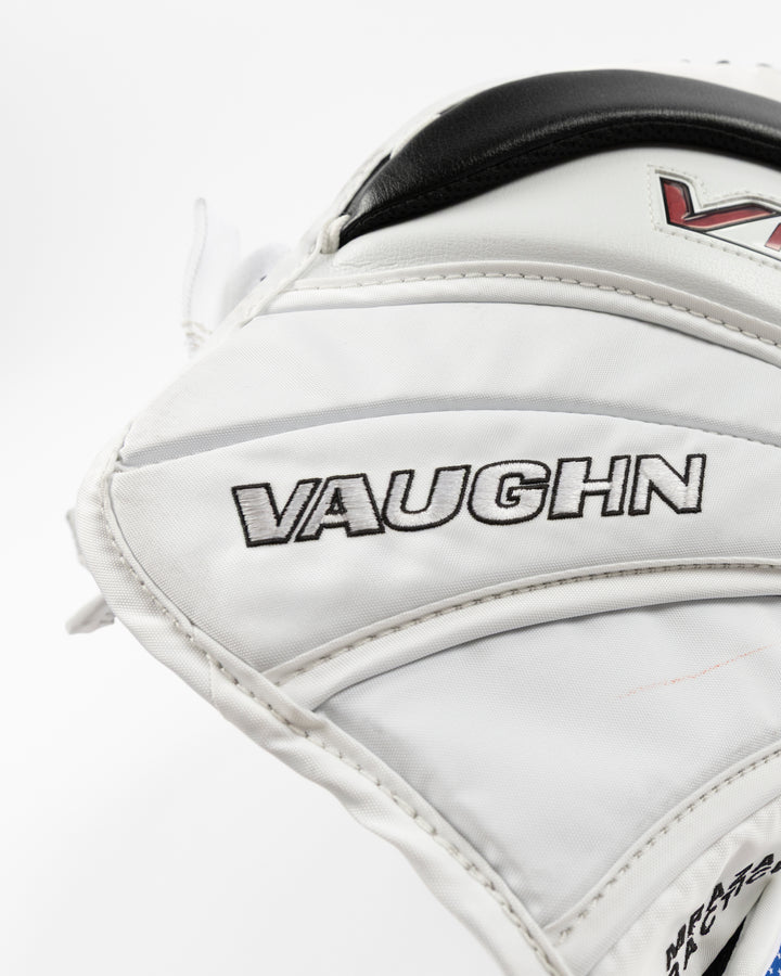 white and red Vaughn hockey goalie glove used by Chicago Blackhawks goalie Petr Mrazek - logo detail lay flat