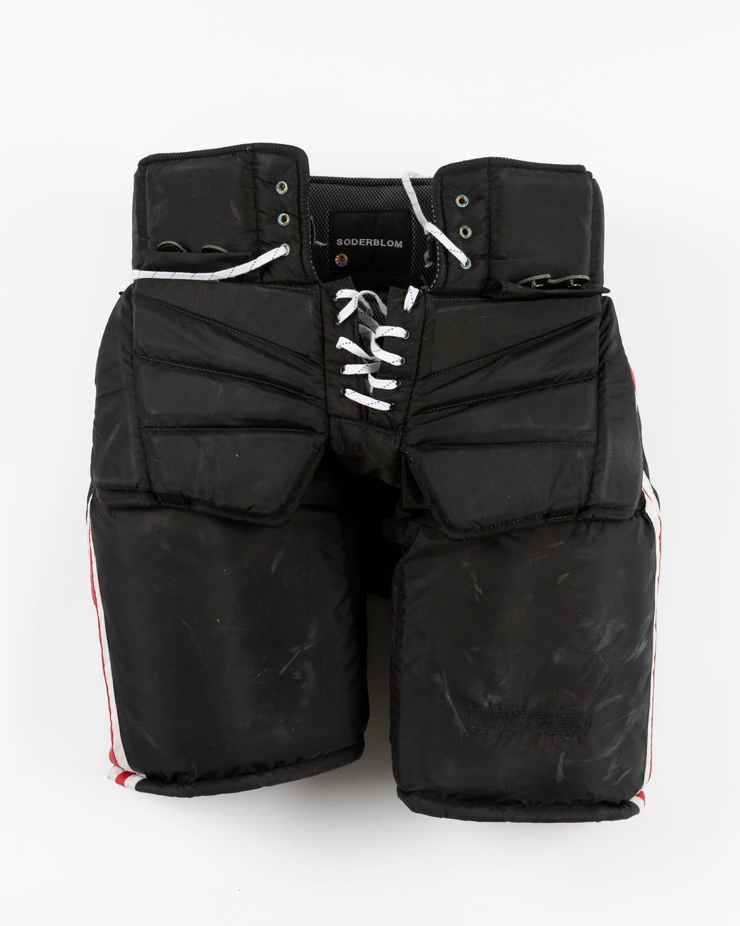 black Vaugh hockey pants used by Chicago Blackhawks goalie Arvid Soderblom - front lay flat