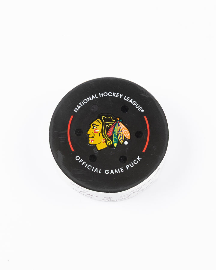 official Chicago Blackhawks hockey puck used in game against Philadelphia Flyers on 3/23/25 - front lay flat