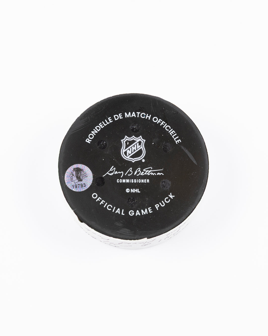 official Chicago Blackhawks hockey puck used in game against Philadelphia Flyers on 3/23/25 - back lay flat