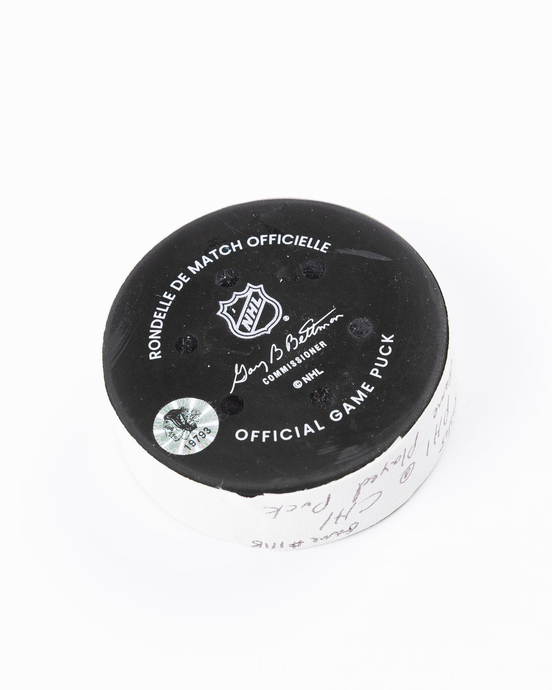 official Chicago Blackhawks hockey puck used in game against Philadelphia Flyers on 3/23/25 - back angle lay flat
