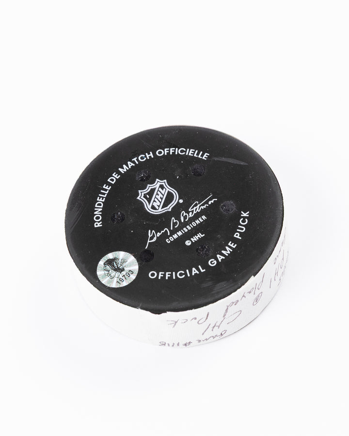 official Chicago Blackhawks hockey puck used in game against Philadelphia Flyers on 3/23/25 - back angle lay flat