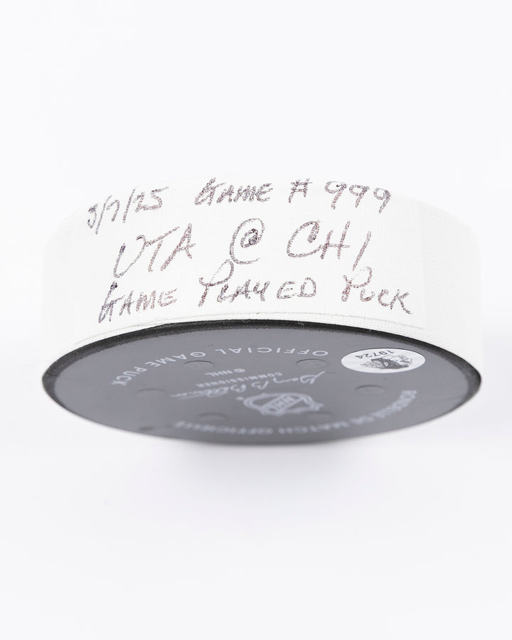 official Chicago Blackhawks hockey puck used in game against Utah Hockey Club on 3/7/25 - tape detail lay flat
