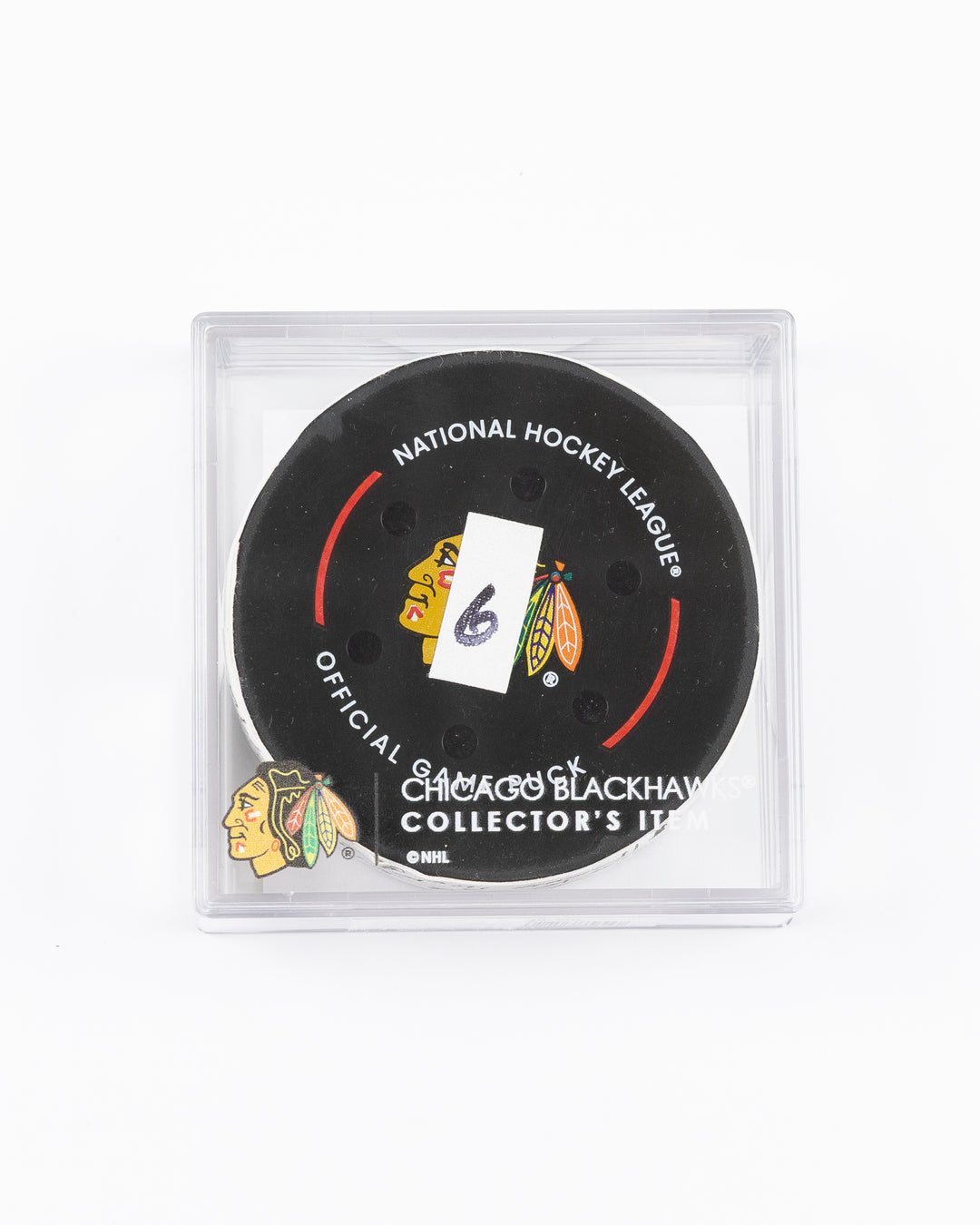 official game used goal puck scored by Chicago Blackhawks player Ryan Donato - front lay flat in case