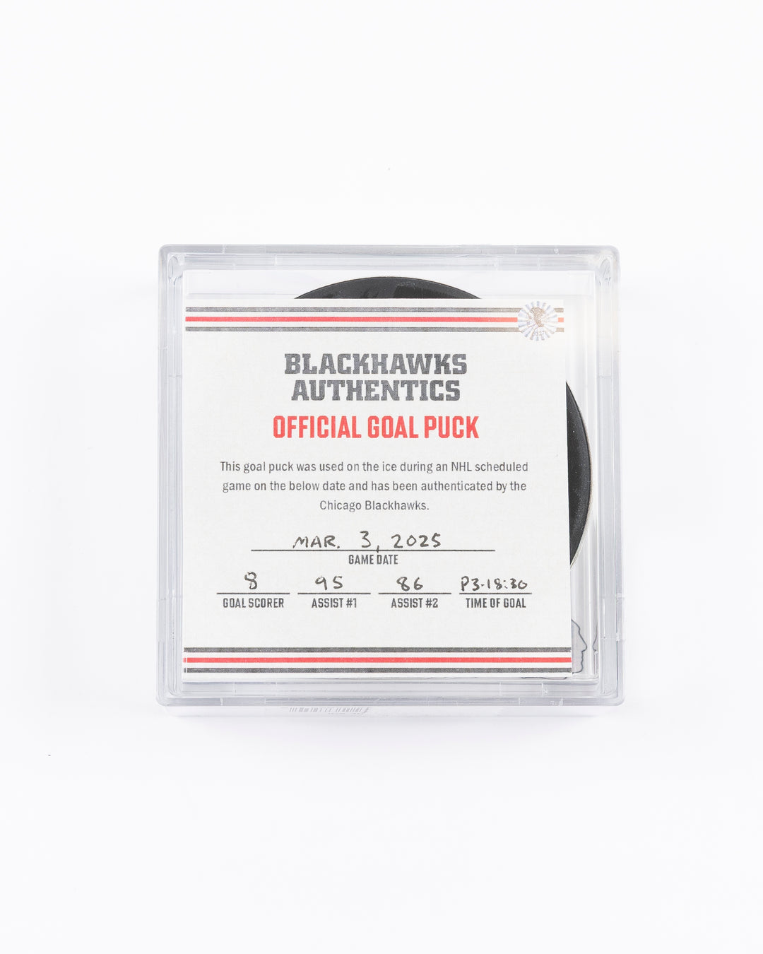 official game used goal puck scored by Chicago Blackhawks player Ryan Donato - front lay flat in case with certificate