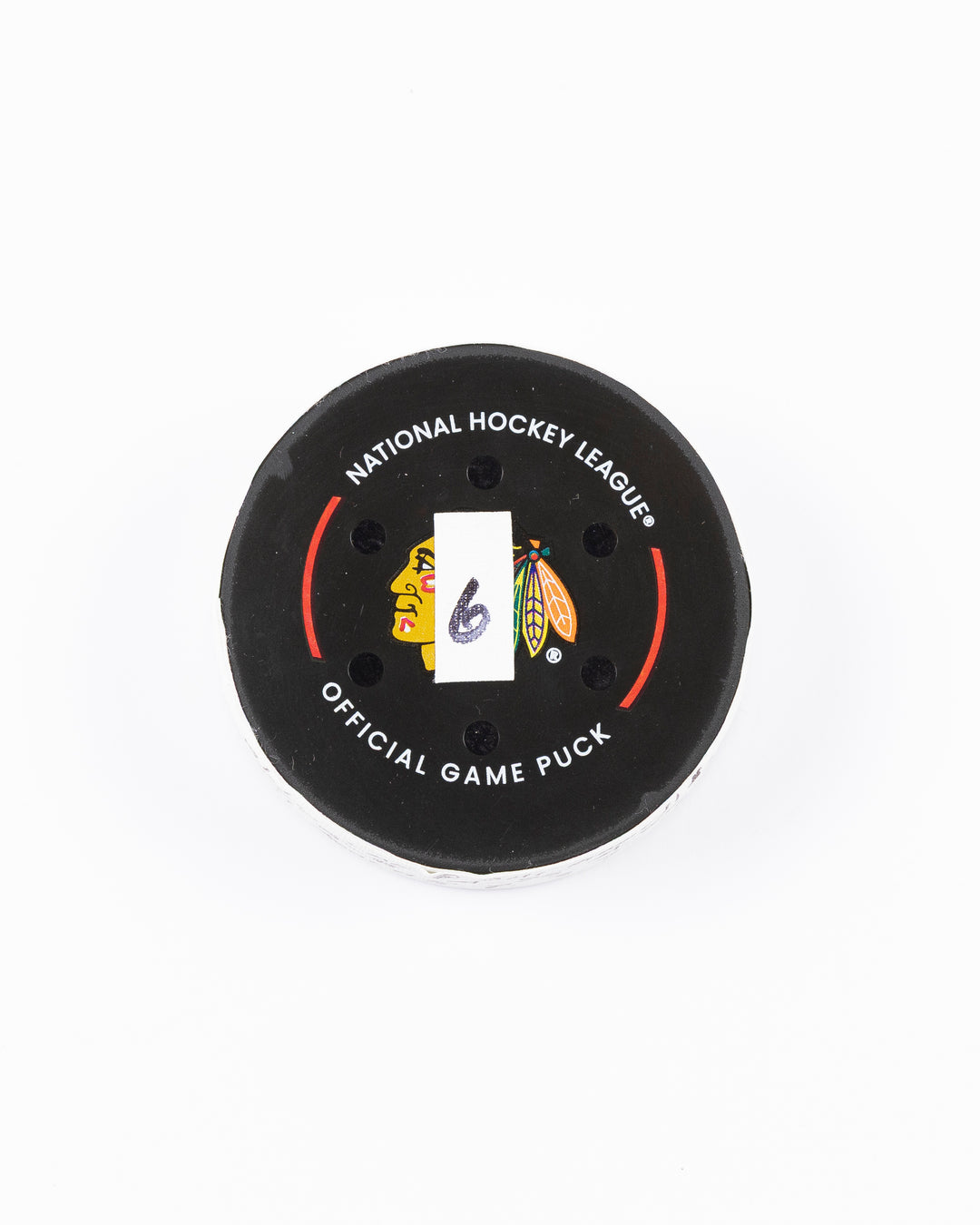 official game used goal puck scored by Chicago Blackhawks player Ryan Donato - front lay flat