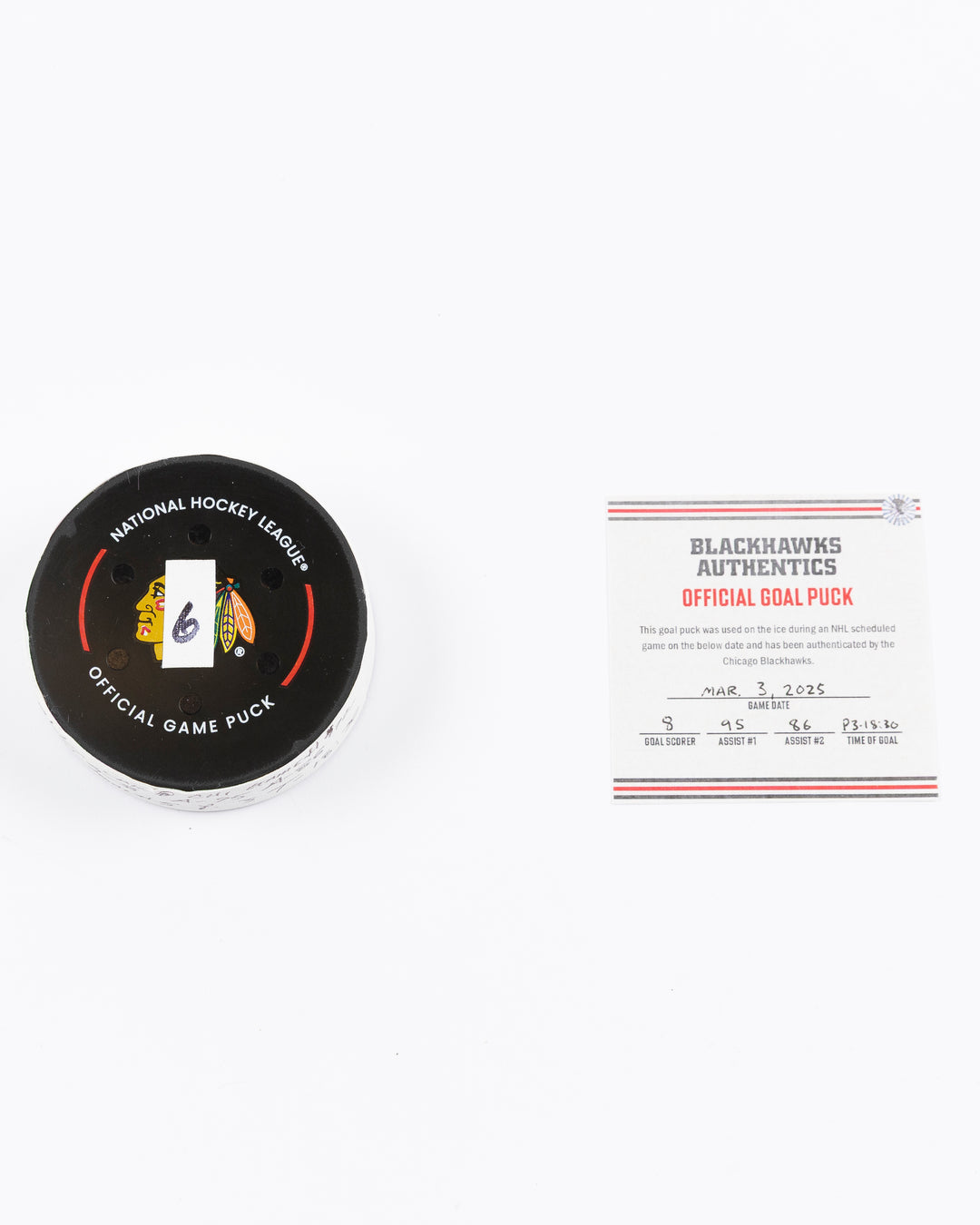 official game used goal puck scored by Chicago Blackhawks player Ryan Donato - front lay flat puck and certificate