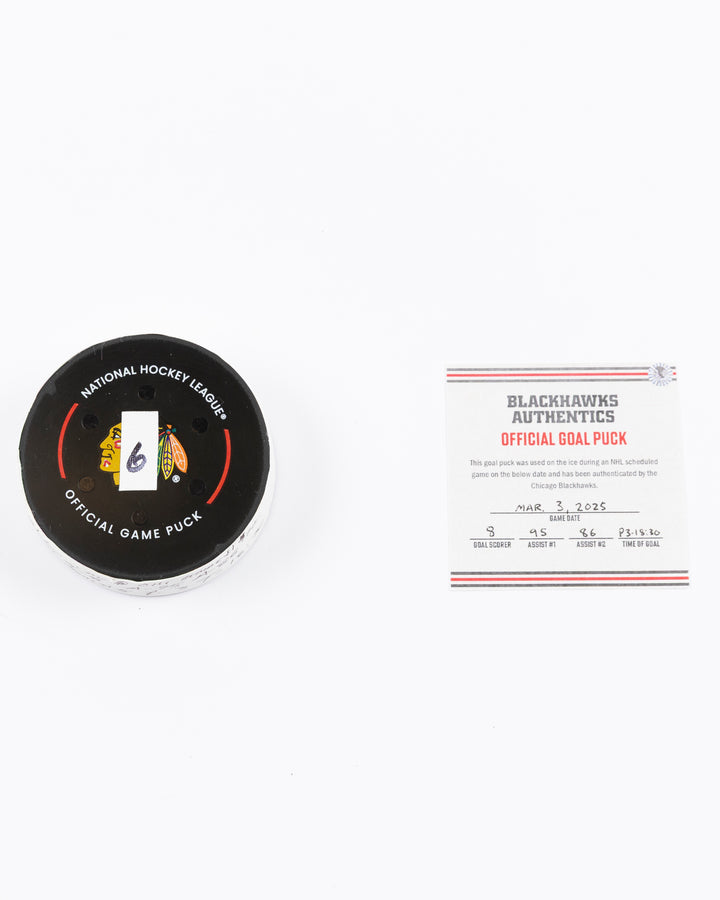 official game used goal puck scored by Chicago Blackhawks player Ryan Donato - front lay flat puck and certificate
