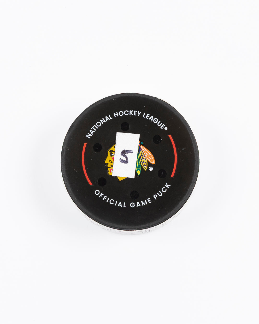 official game used goal hockey puck scored by Chicago Blackhawks player Andreas Athanasiou - front lay flat